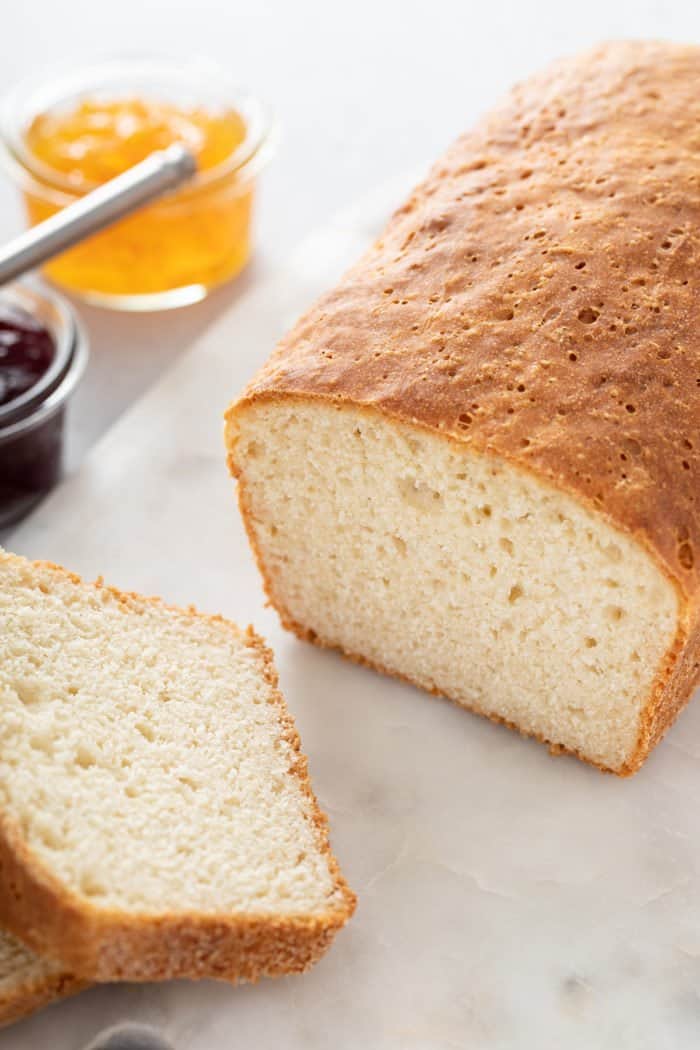 Close up of a sliced piece of english muffin bread, showing the nooks and crannies