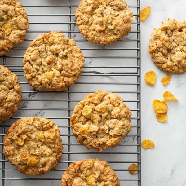 Cornflake cookies cooling on a wire rack