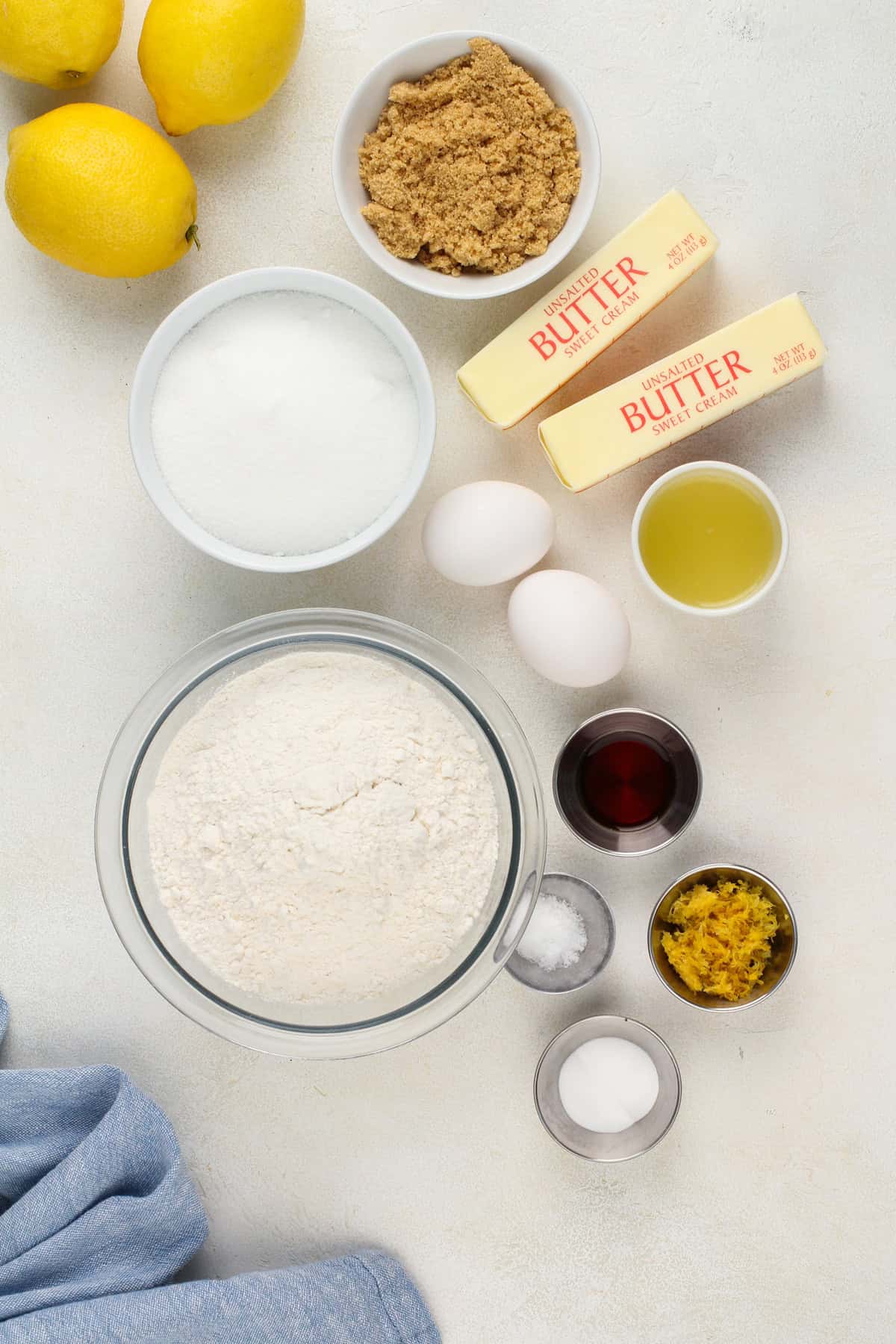 Ingredients for lemon cookies arranged on a countertop.