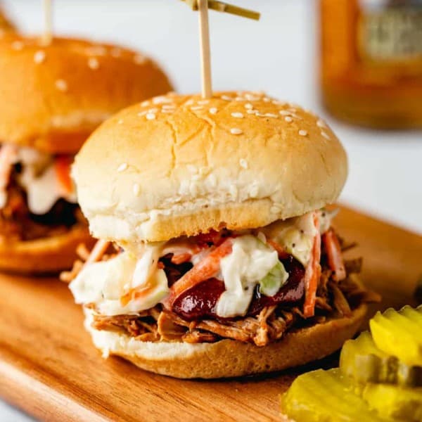 Whether you forgot to get dinner started early or had a last minute craving strike, you can still have pulled pork sandwiches for dinner thanks to the Instant Pot! Instant Pot Pulled Pork is every bit as delicious as the slow cooked version but comes together in a fraction of the time.