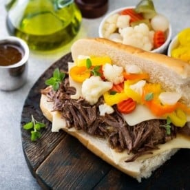 Italian beef sandwich on a wooden board