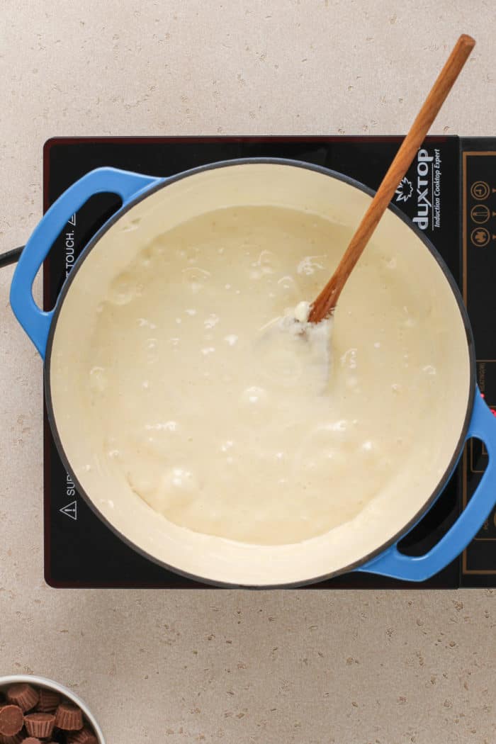 Melted marshmallows and butter in a large dutch oven.