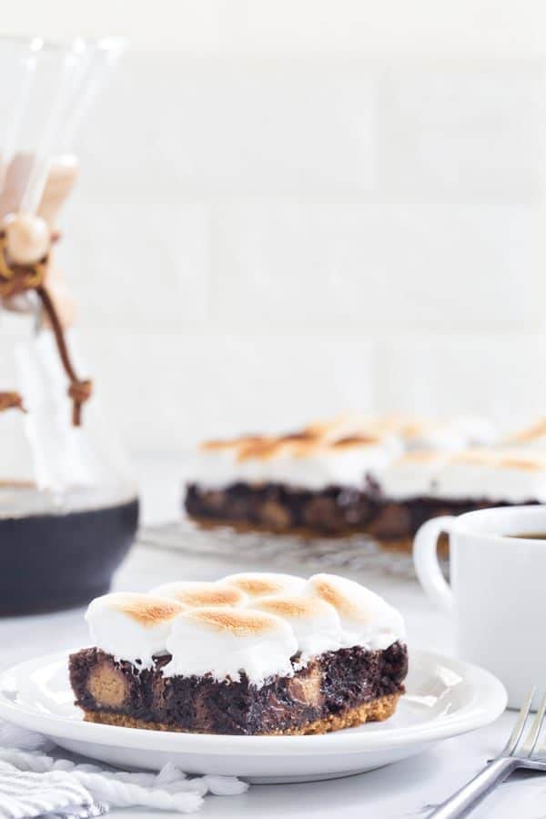 Peanut Butter Cup S'mores Brownies will easily be your new favorite dessert. They're ooey, gooey and totally delicious!