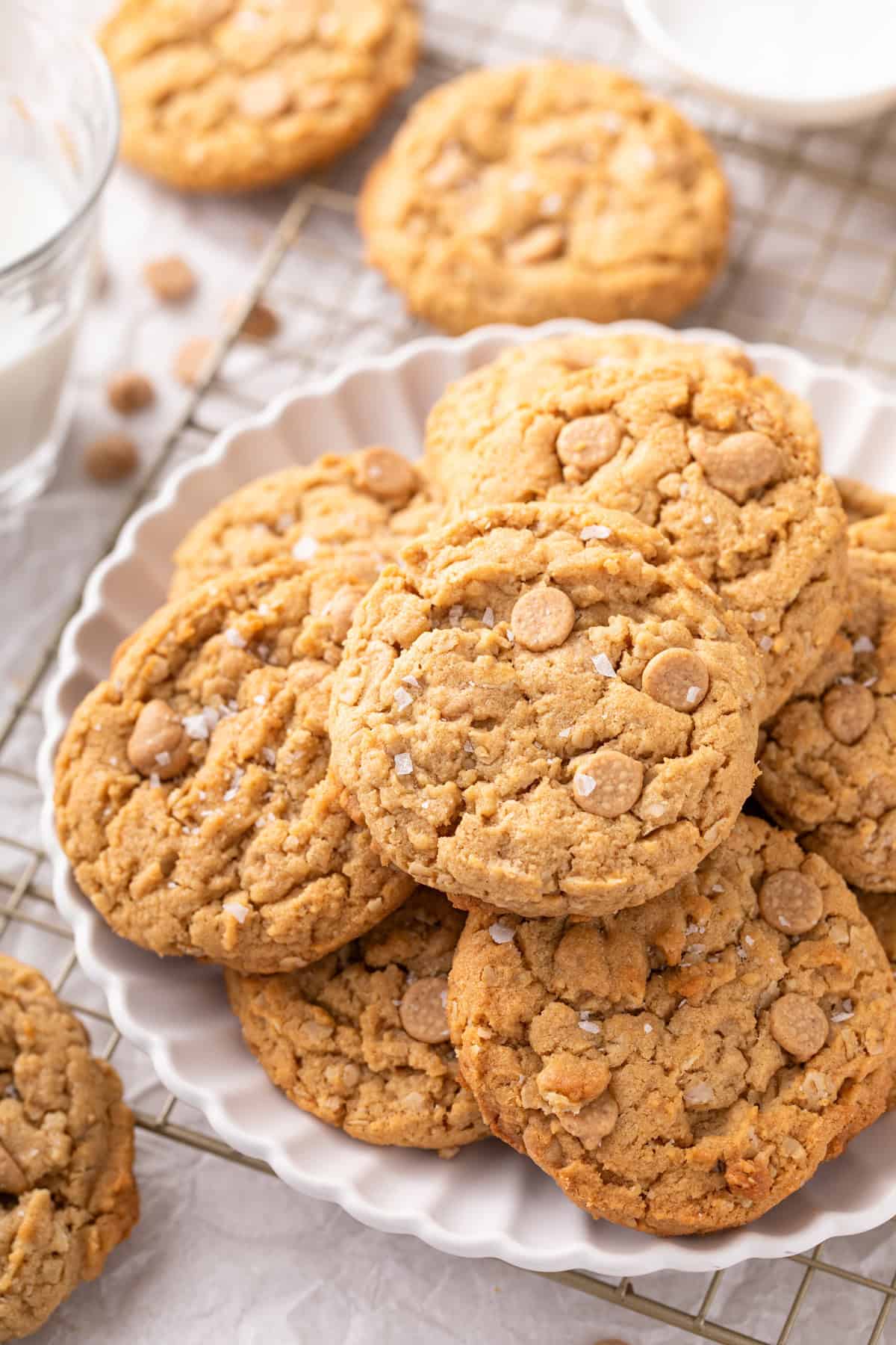 Peanut butter oatmeal cookies arranged on a white platter.