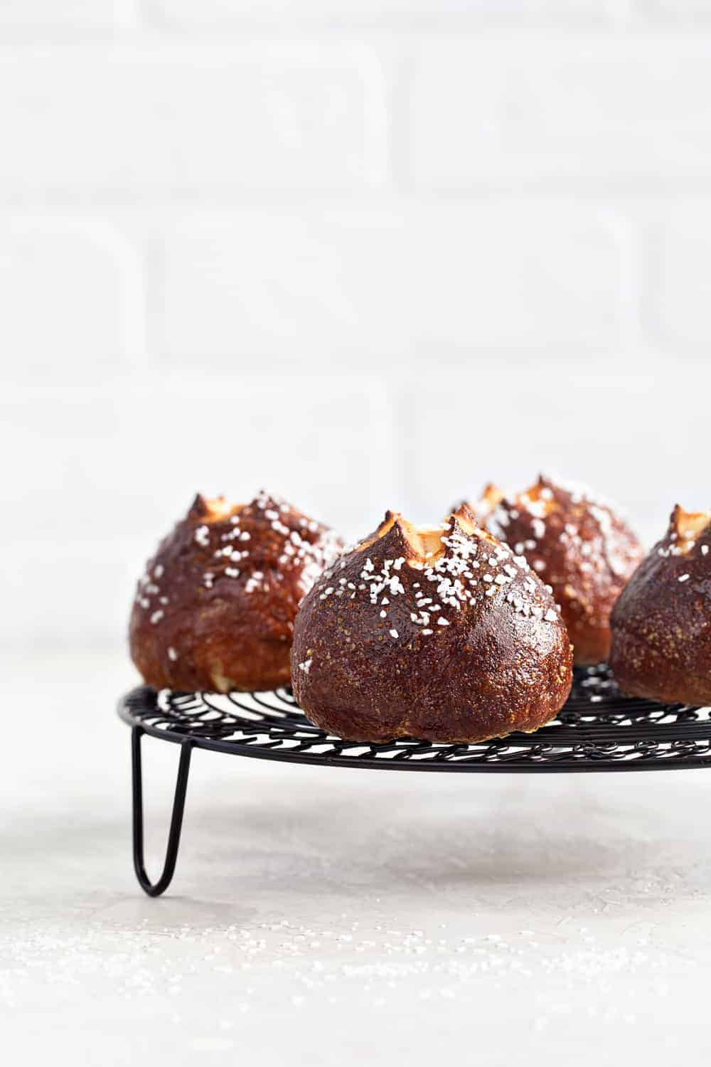 Fluffy Pretzel Rolls are the perfect addition to any dinner table. Fun and simple to make!