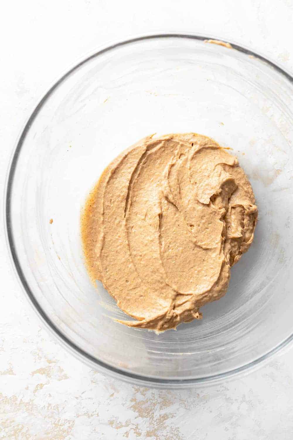 Pumpkin cream cheese mixture for swirl in pumpkin blondies in a glass mixing bowl