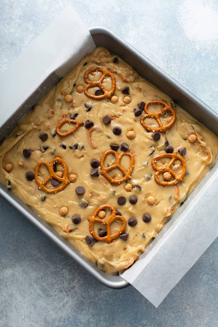 Batter for salted caramel blondies in a baking pan, ready to bake