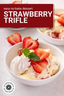 Serving of strawberry trifle in a white bowl. Text overlay includes recipe name.