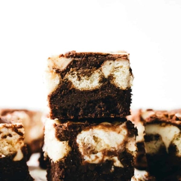 Side view of sliced and stacked tiramisu brownies