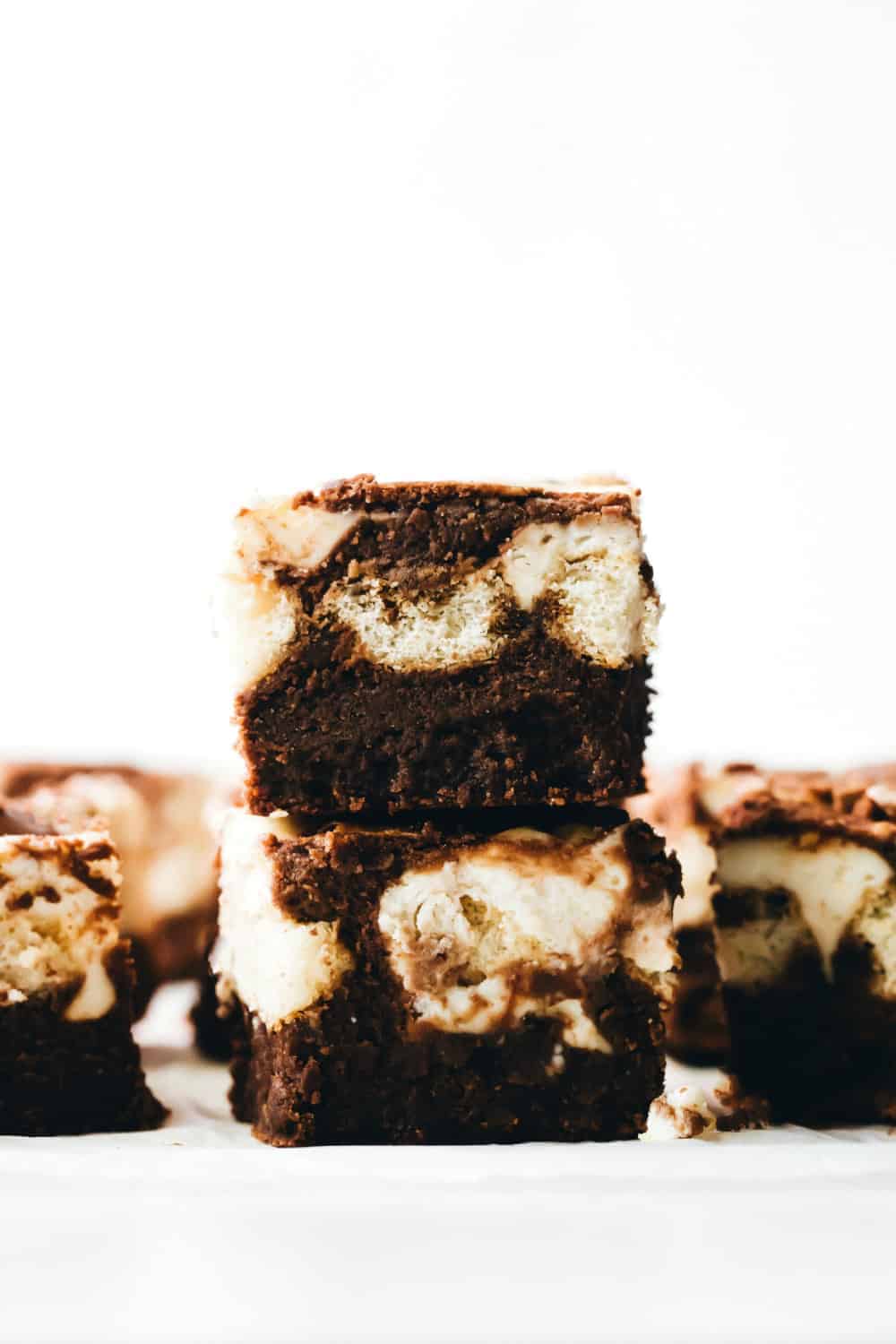 Side view of sliced and stacked tiramisu brownies