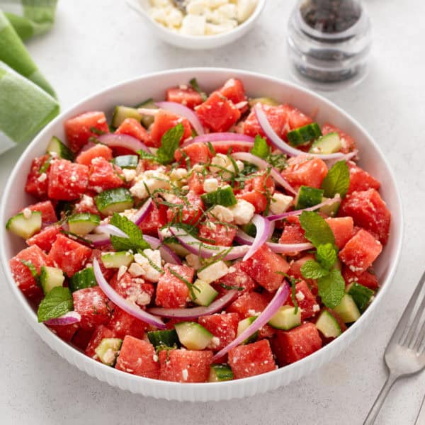 Watermelon feta salad in a white serving bowl.